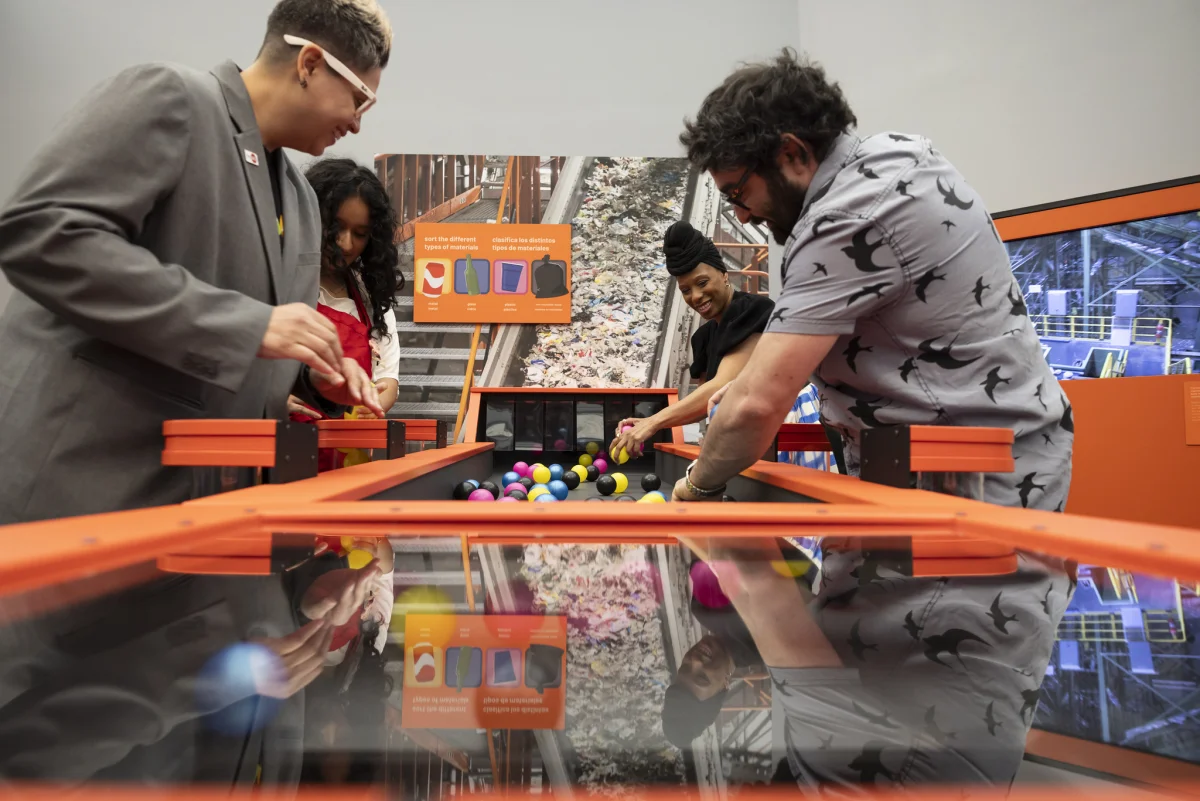 Visitors interacting with CityWorks exhibit